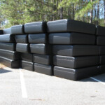 Many Formex dock floats stacked and in stock